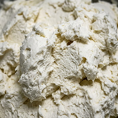 Fresh white butter in bulk for bakeries and food industry.