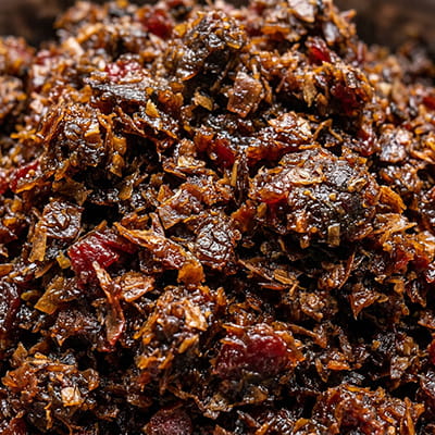Flavored hookah and shisha tobacco blends, processed for bulk B2B export.
