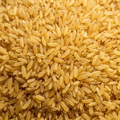 Golden parboiled rice popular across South Asian markets.