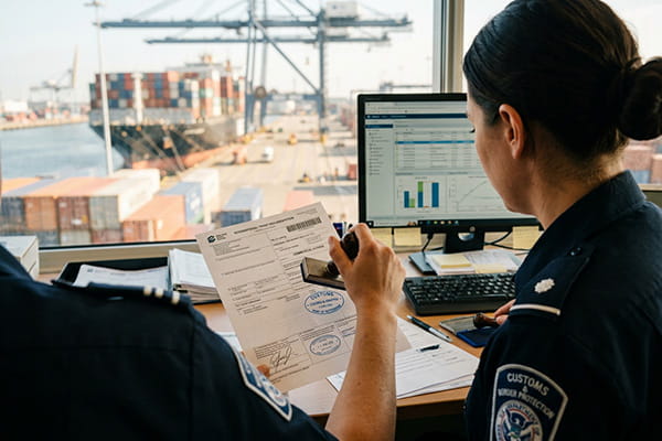 Official stamping of trade documents representing AB Export's expert customs clearance services.